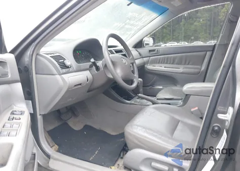 2003 Toyota Camry Le z USA, uszkodzony, nr VIN 4T1BE32K03U697561